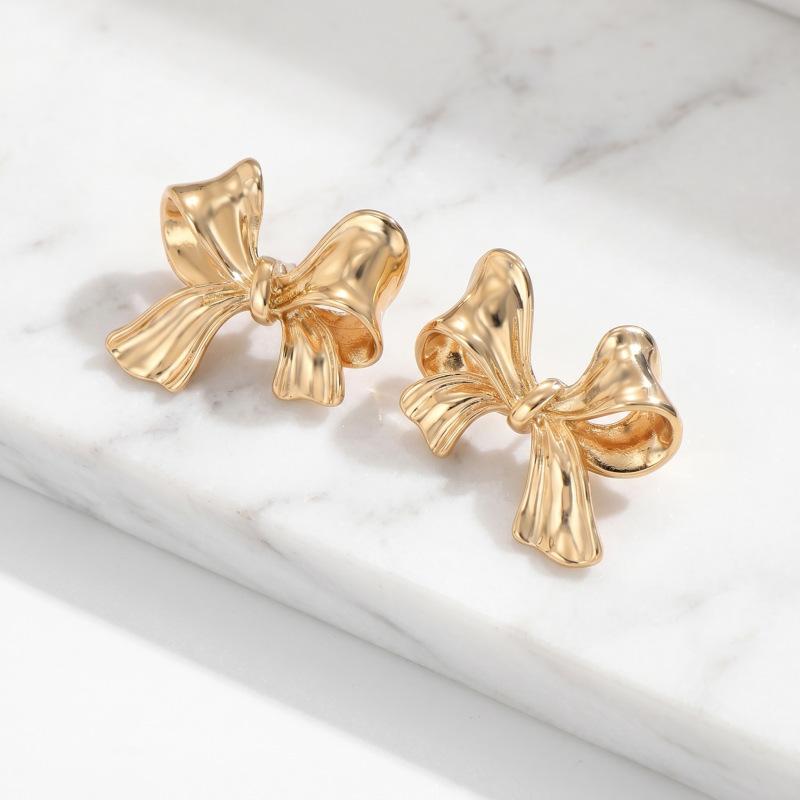 Hot-selling French gold bow stud earrings women's small fresh tied sweet earrings personalized ear jewelry stud earrings