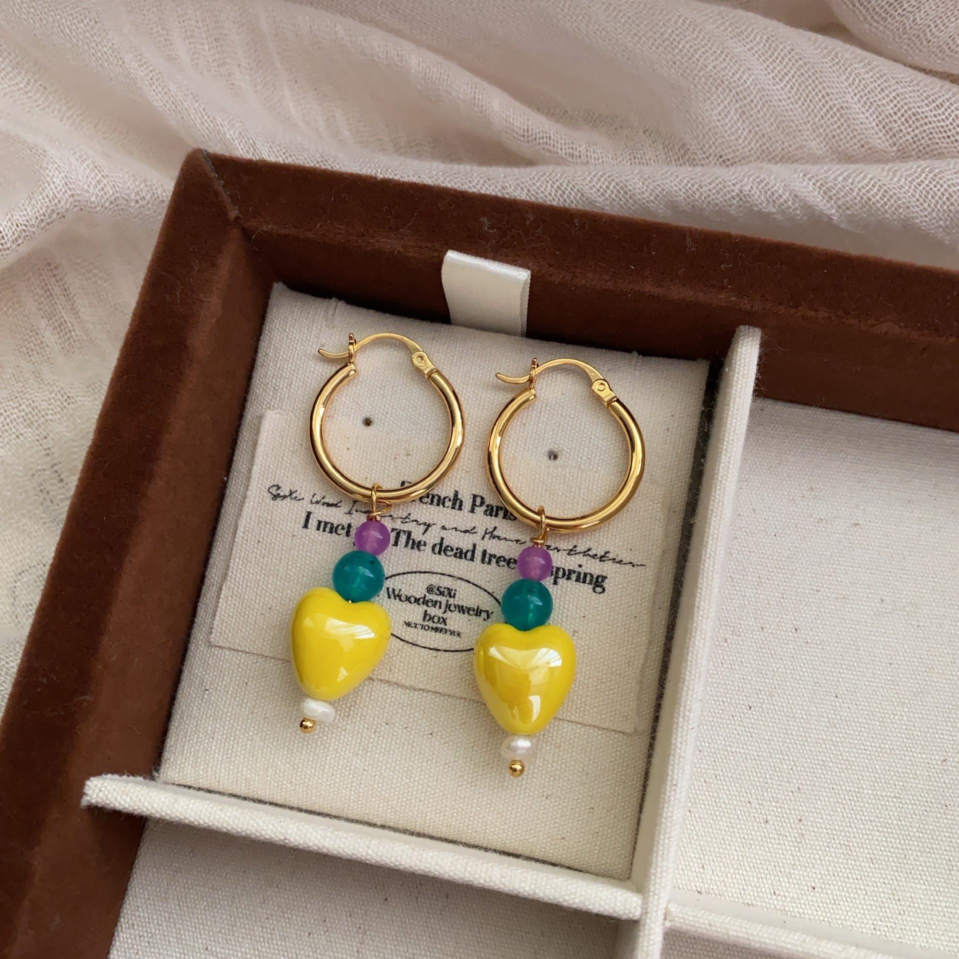 Elegant temperament design sense small fresh yellow earrings girls simple niche versatile love bead earrings earrings