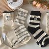 Women's Japanese Style Striped Cartoon Puppy Mid-Calf Cotton Socks - Cute, Breathable, and Versatile Embroidery Design.