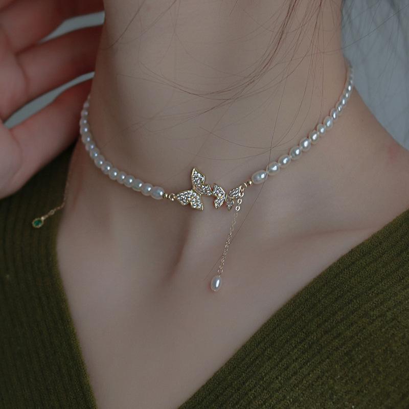 Vintage light luxury butterfly pearl necklace female pendant feeling collarbone neck chain choker