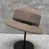 French Elegant Woolen Woolen Basin Hat Women'S Autumn And Winter Fashion Versatile Velvet Bow Flat Top Fisherman Hat Top Hat