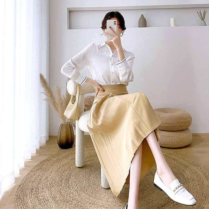 Falda Sencilla Irregular Sólida Drapeada Plisada Femenina Primavera Temperamento Viajera Cintura Alta Línea A Largo Medio Falda de Traje