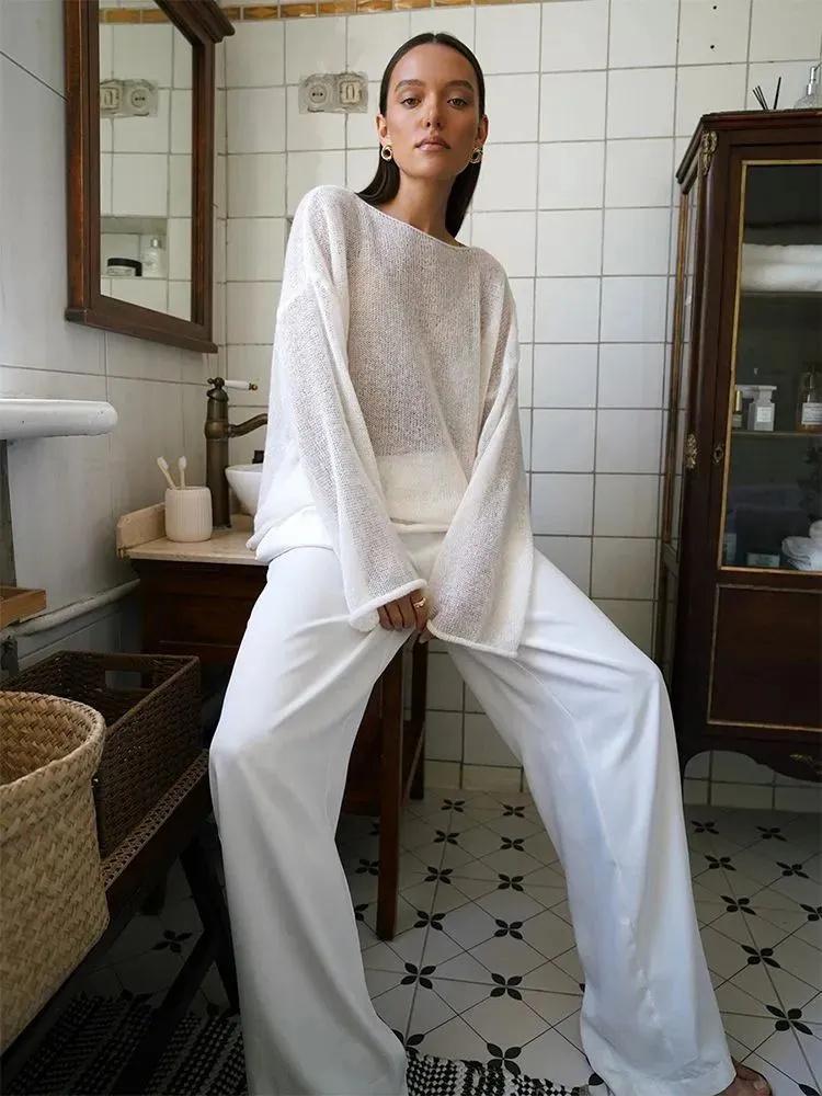 Lightweight Knit Pullover Sweater with Wide Round Neck and Flared Long Sleeves Loose Fit Layered Hem Casual Top for Women