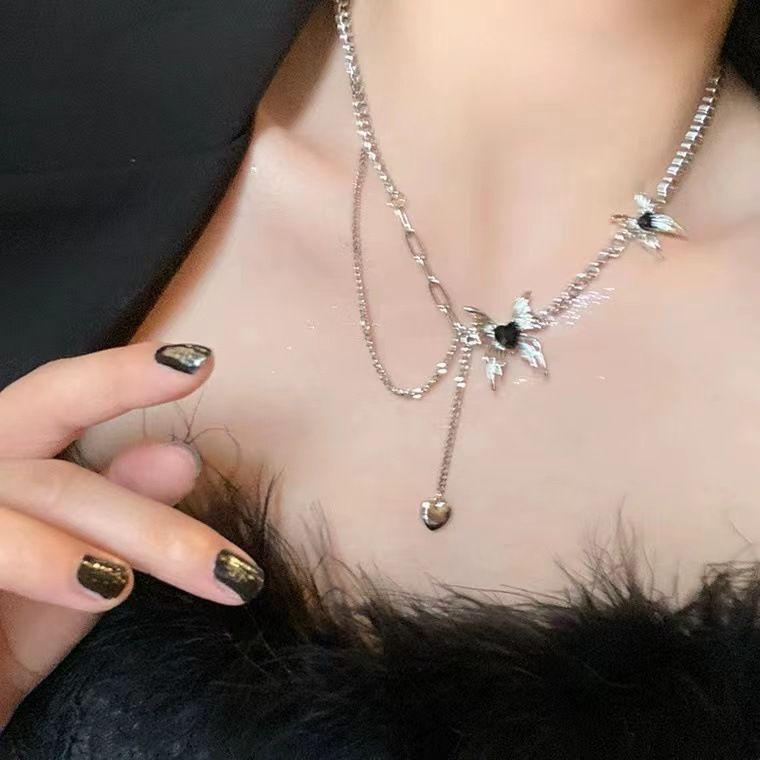 Xingxin~~ Liquid butterfly fringed necklace 2023 new high-end design light luxury niche sweater chain women's spring