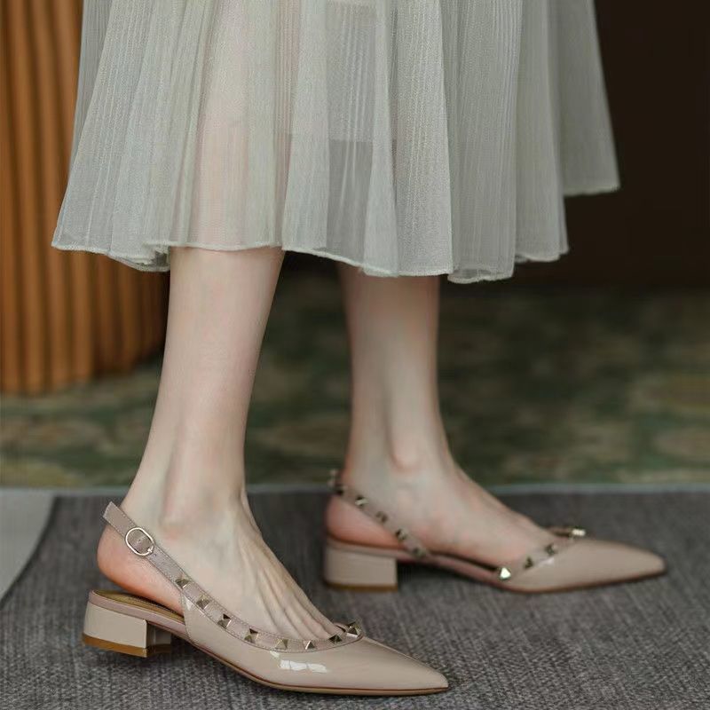 French pointed rivet thick heel shoes 2024 spring and summer Internet celebrity patent leather nude sandals temperament rear empty heel single shoes