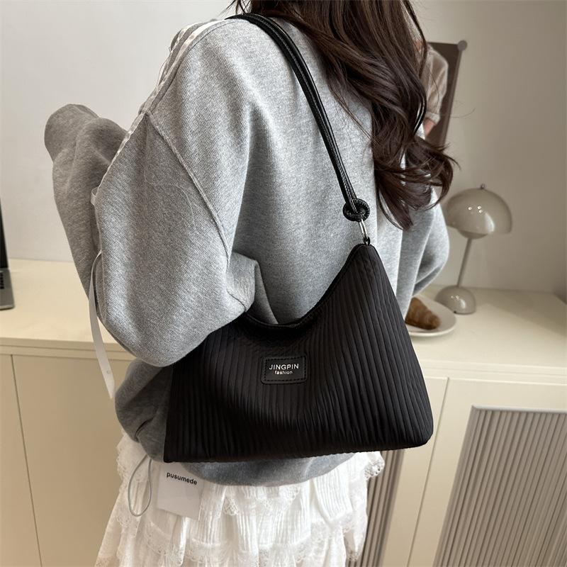 2025 Casual Large-capacity Indentation Stripes Fresh New Summer Foreign Style Commuting Solid Color Shoulder Underarm Handbag