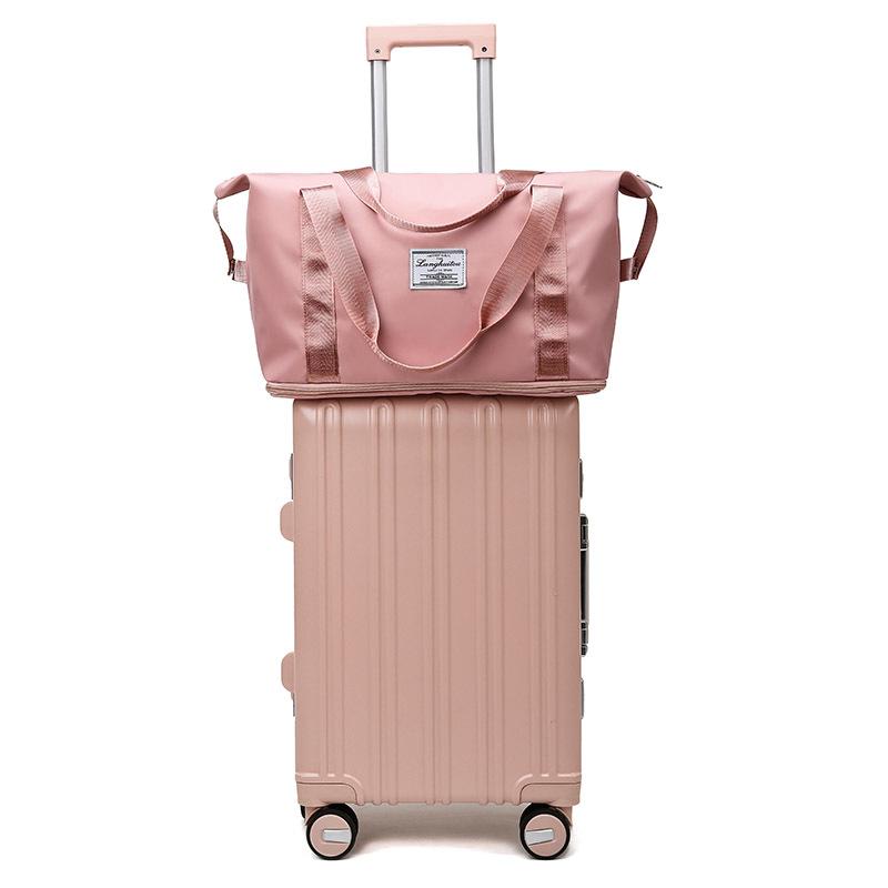 Foldable Waterproof Carry-on Travel Bag - Women's Large Capacity for Business, Fitness, and Yoga.