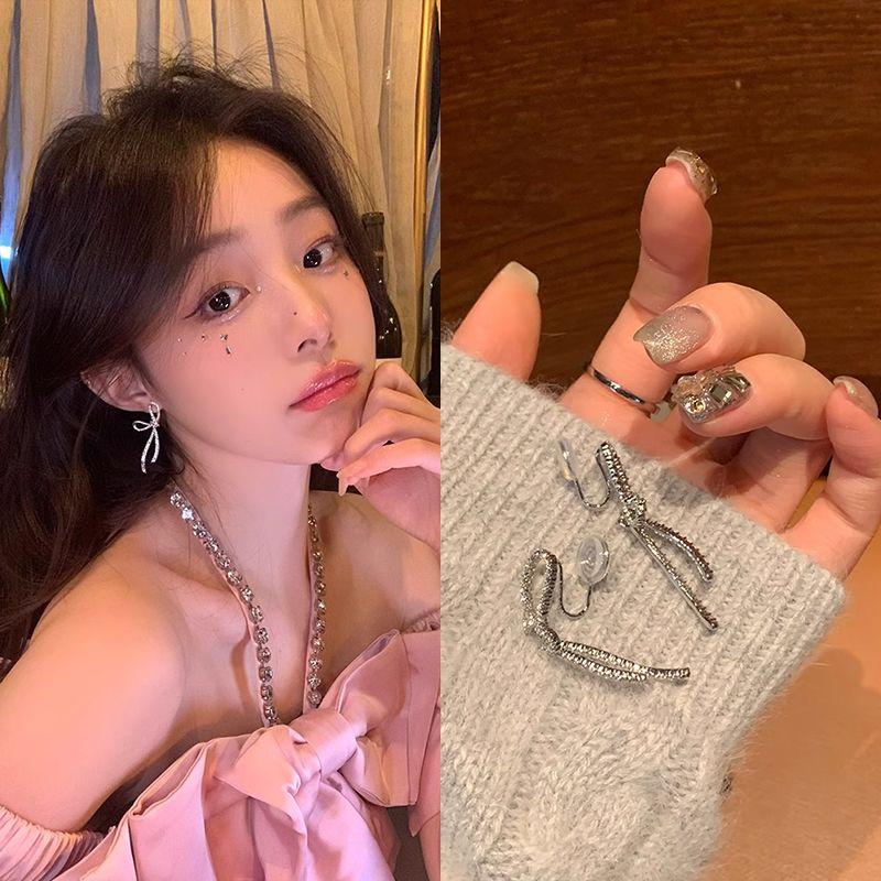 

Доступная роскошь Самые продаваемые Уникальные женские клипсы для ушей в виде москитных спиралей с бантиками No ear hole mosquito coil ear clip main picture!!