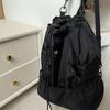 Large capacity nylon sports and leisure backpack 2025 new versatile drawstring schoolbag Korean niche shoulder bag tide