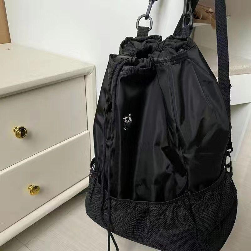 Large capacity nylon sports and leisure backpack 2025 new versatile drawstring schoolbag Korean niche shoulder bag tide