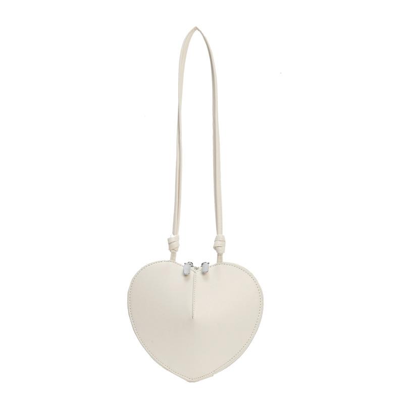 Niche design mini bag women's 2025 new fashion solid color love headphone bag crossbody change lipstick bag