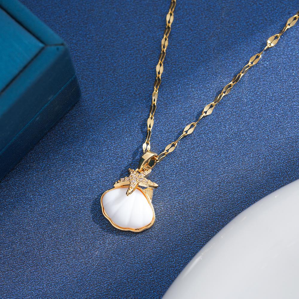 Gold-Plated Titanium Necklace with Colorful Shell Starfish Pendant and Zircon Inlay - High-End Cool Style.