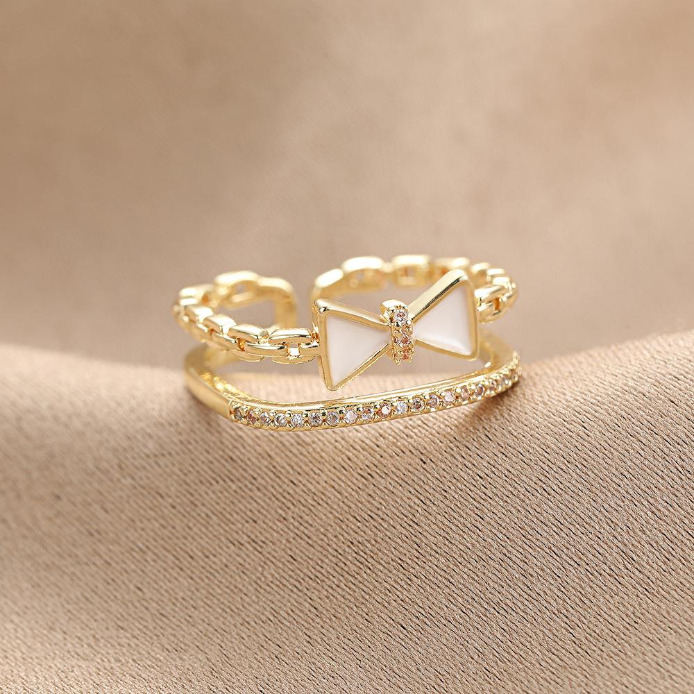 Korean style hollow out double-layer bow ring for women, light luxury, sweet personality, open index finger rings