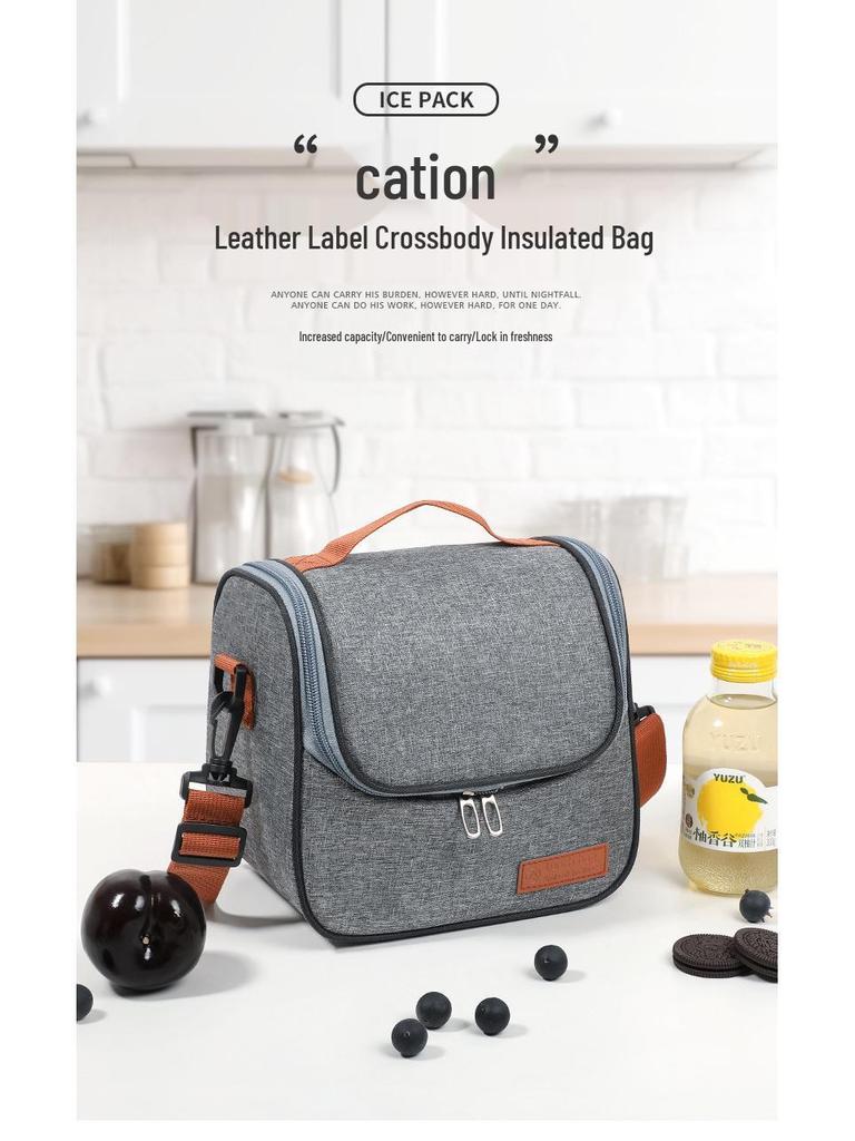 Izolowana torba na lunch crossbody: Gruba folia aluminiowa dla przedłużonej świeżości i zachowania zimna.