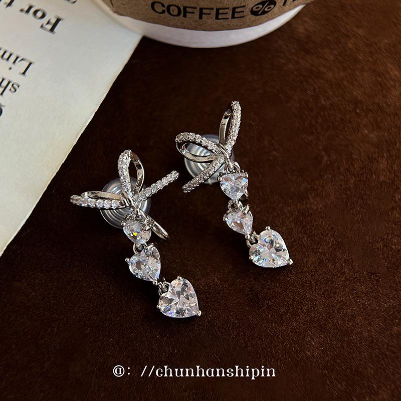 Bow love zircon stud earrings women's light luxury niche design high-end ear clips mosquito coil disc earrings without earholes