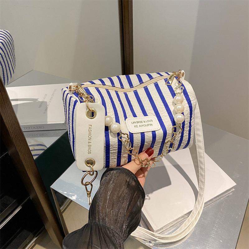 Exquisite high-end textured small bag 2025 summer new small fresh powder grid pillow bag versatile messenger shoulder bag