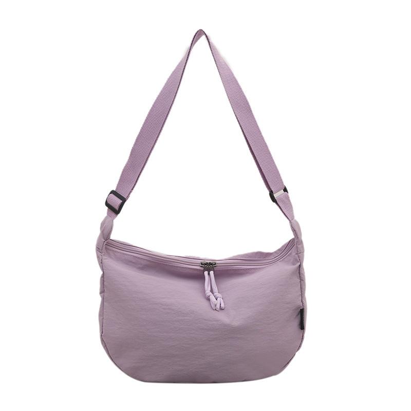 

Japanese ins style casual versatile cloth bag messenger bag female 2025 college students commute to class large-capacity dumpling bag фіолетовий