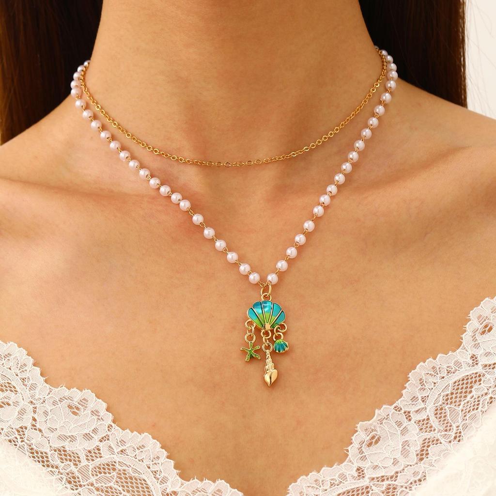Set Collana e Bracciale Estivo Bohemien con Stella Marina, Conchiglia e Perle