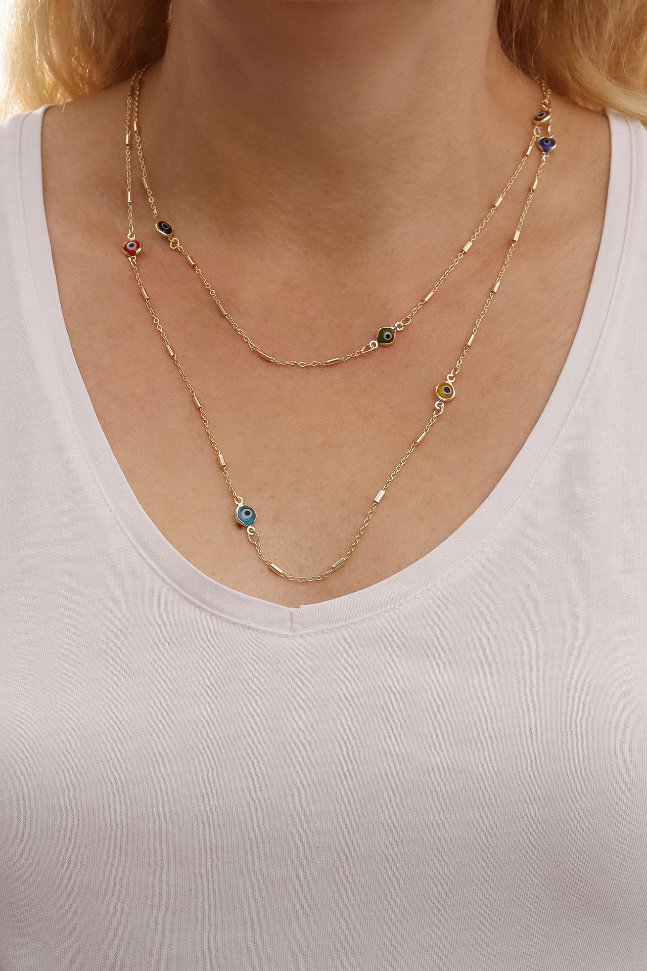 

Длинное цветное ожерелье золотого цвета сглаза