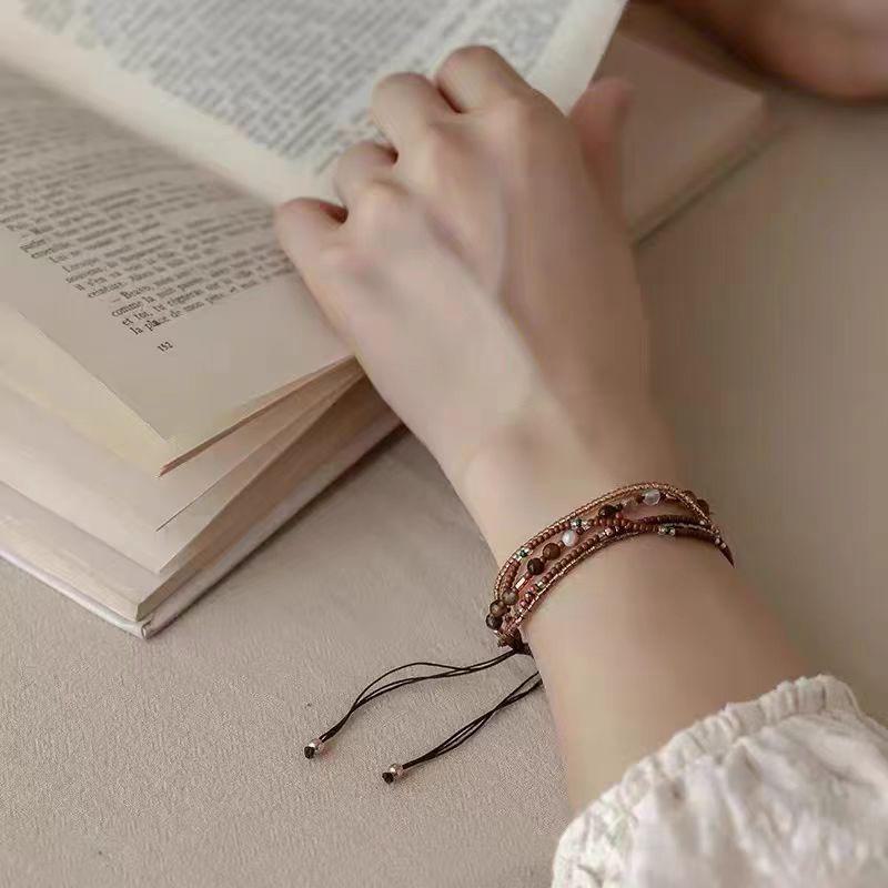 "Women's Multilayer Beaded Bracelet: Elegant Chinese Style, Adjustable Braided Design"