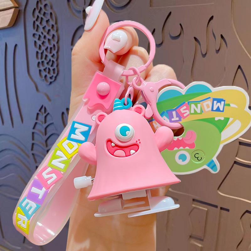 Cartoon Little Monster Clockwork Walking Robot Keychain Pendant Creative Decompression Car Bag Keychain Pendant opp bag packaging