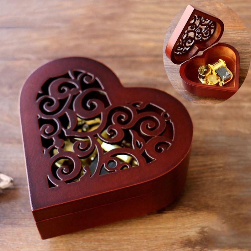 Urocza prostokątna rzeźbiona drewniana pozytywka nakręcana z melodyjnymi melodiami