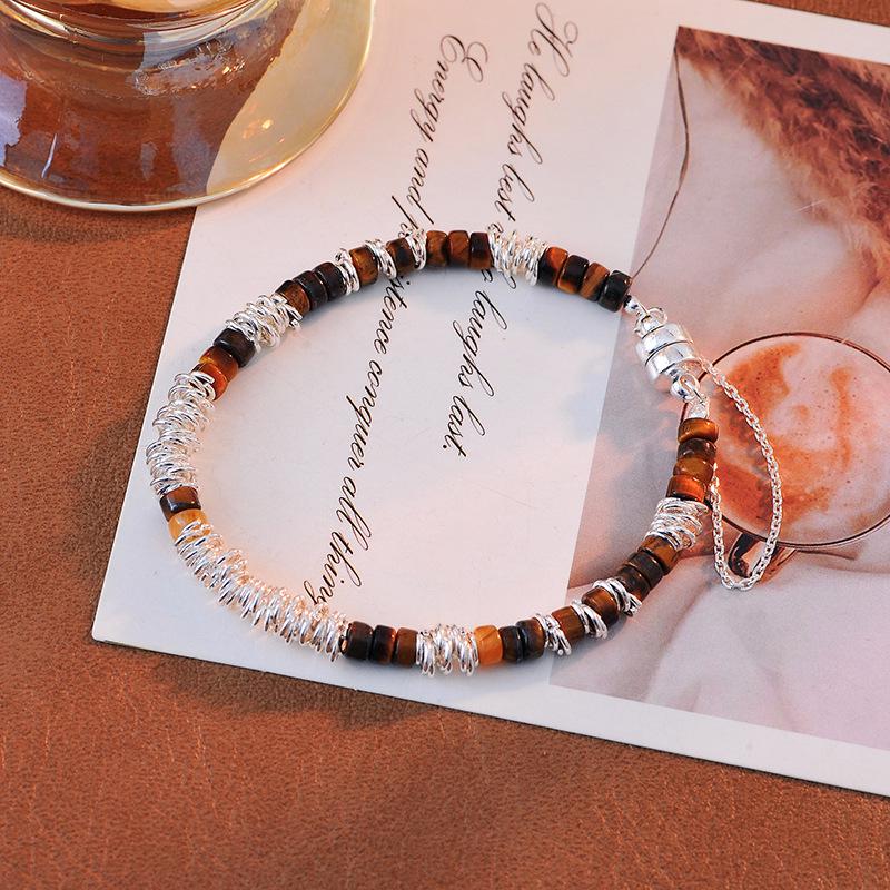 

Elegant Tiger Eye Silver Circle Bracelet for Women - Stylish and Sophisticated Design