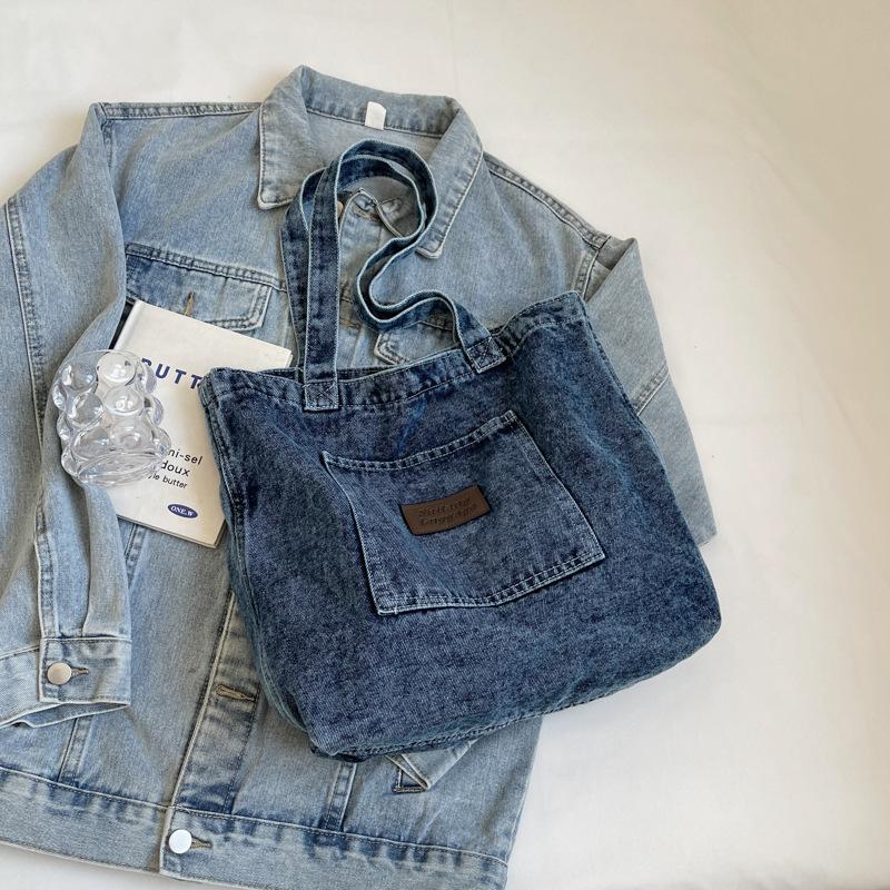 Korean version of casual washed denim bag women's 2025 new fashion canvas pocket literary shoulder bag tote bag