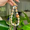 Adorable Charcoal Cat Paw Charm: Versatile Phone & Bag Accessory