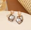 Pearl earrings retro temperament earrings design sense earrings silver needle French red versatile