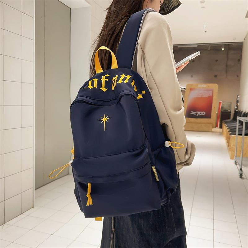 College-Stil Rucksack mit Buchstabenstickerei Leichte Schultasche Damen Rucksack mit großem Fassungsvermögen
