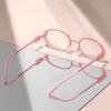 The  new oval-shaped anti-blue light glasses feature a small metal frame with a heart-shaped decoration for daily wear