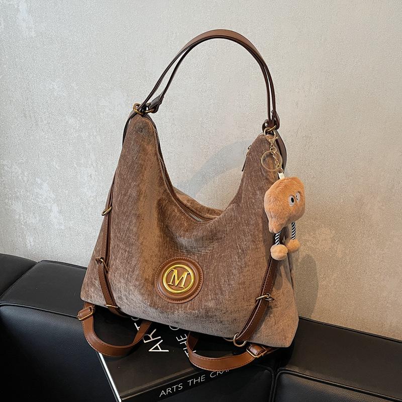 

Commuter retro large-capacity bag women s 2024 new backpack autumn and winter shoulder bag tote bag темно-коричневого кольору