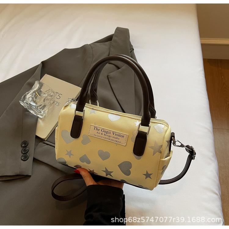 

Bag women s 2025 new spring and summer portable flower Boston bag fashion printing messenger bag niche design commuter bag жёлтый