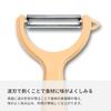 Victorinox Stainless Steel "Swiss Classic" Peeler, Serrated/Wavy Edged for Kitchen and Household, Swiss Trend Colors Special Edition - Tangerine, Swi