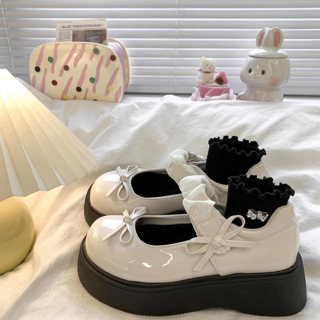 Thick-soled shallow-mouth single shoes women's 2025 new fashion bow small leather shoes heightening French with skirt Mary Jane shoes