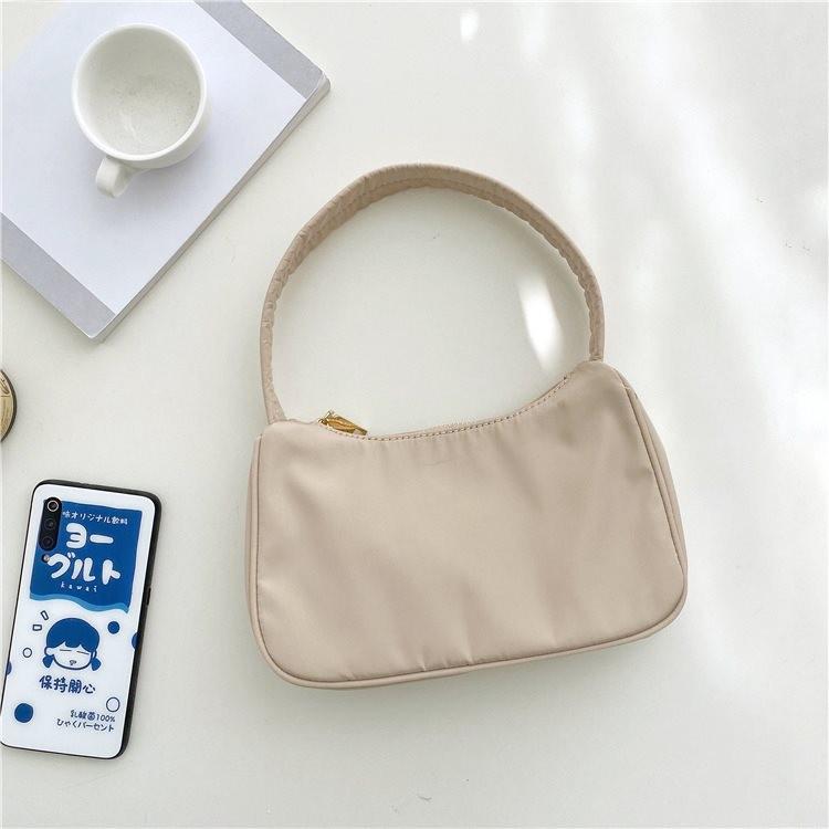 Trendy Urban Minimalist Small Nylon Handheld Bag For Women Available In Elegant Shades