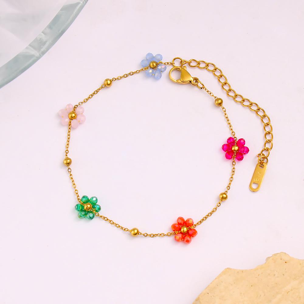 Elegant 18K Gold & Stainless Steel Necklace Bracelet Set with Colorful Crystal Beads & Small Flower Charms.