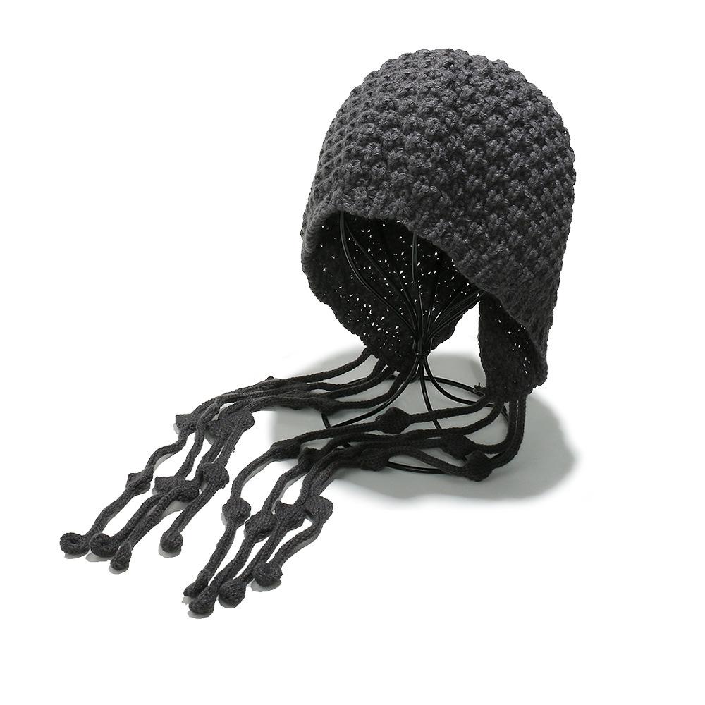 Autumn and winter warm wool hat, hand-woven hollow bag head hat, women's ethnic style fringed ear protector, knitted hat, women