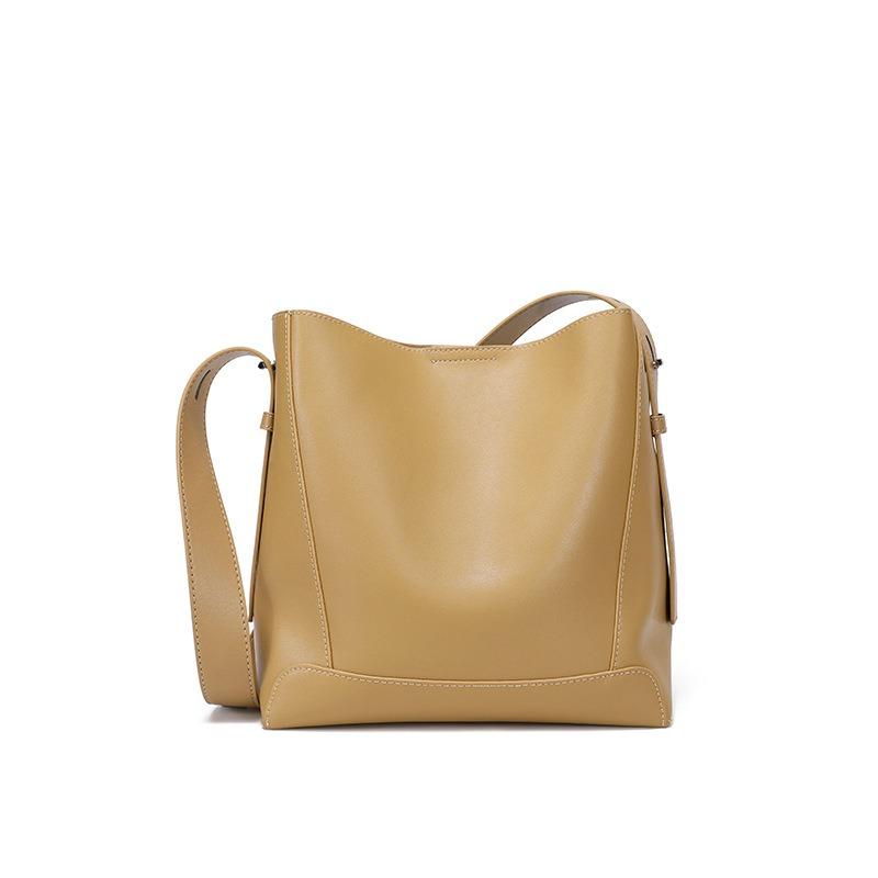 Cowhide bag women's versatile commuter bucket bag new leather women's bag high-end niche design shoulder bag