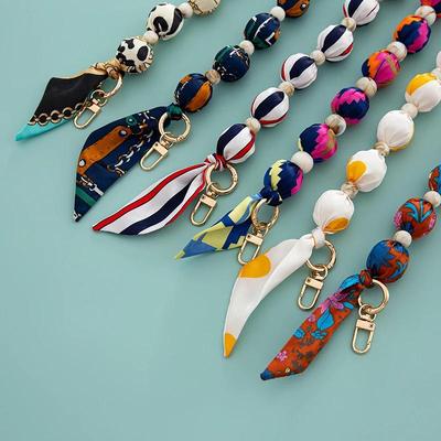 Lebendige Luxus-Handtaschen- und Handyketten im europäisch-amerikanischen Stil und mit von Schals inspirierten Perlendesigns