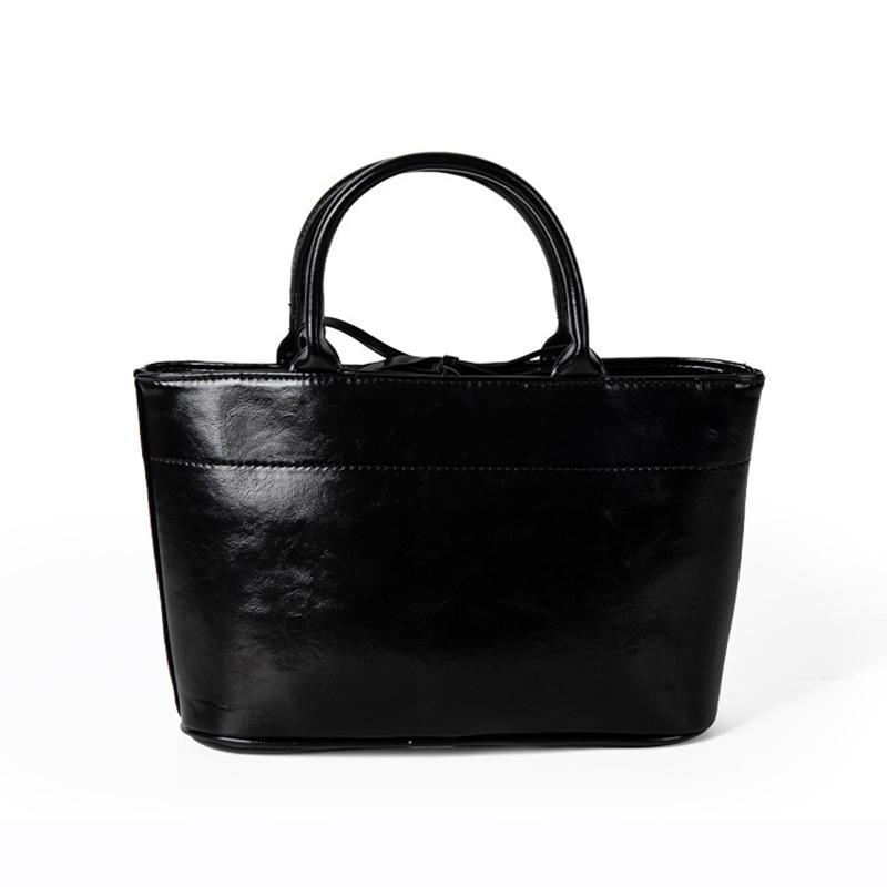 Textured PU leather travel bag for women large capacity red minimalist chic versatile leisure shopping travel