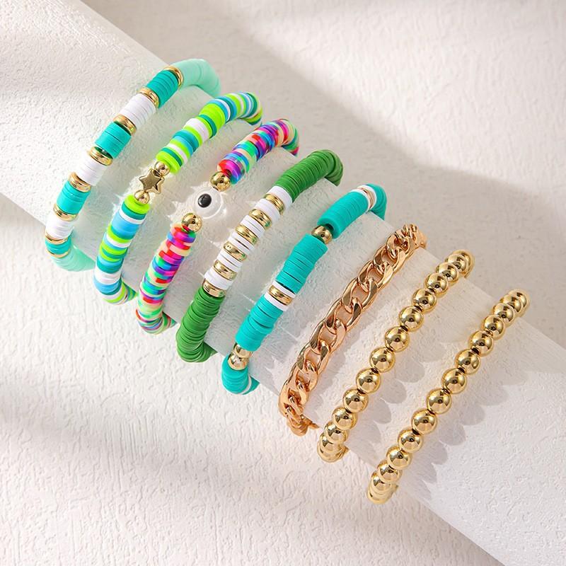 Korean version of fashion new multi-layer elastic thread soft pottery love smiley face bracelet set retro handmade pearl jewelry women