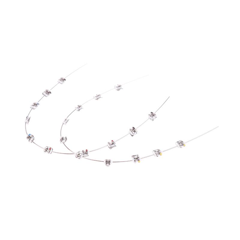 2 Stück Mode Split-Typ Mini Bunte Brackets Fake Zahnspangen Ohne Haken Temporäre Zahndekoration Metallbracket Zahnwerkzeug
