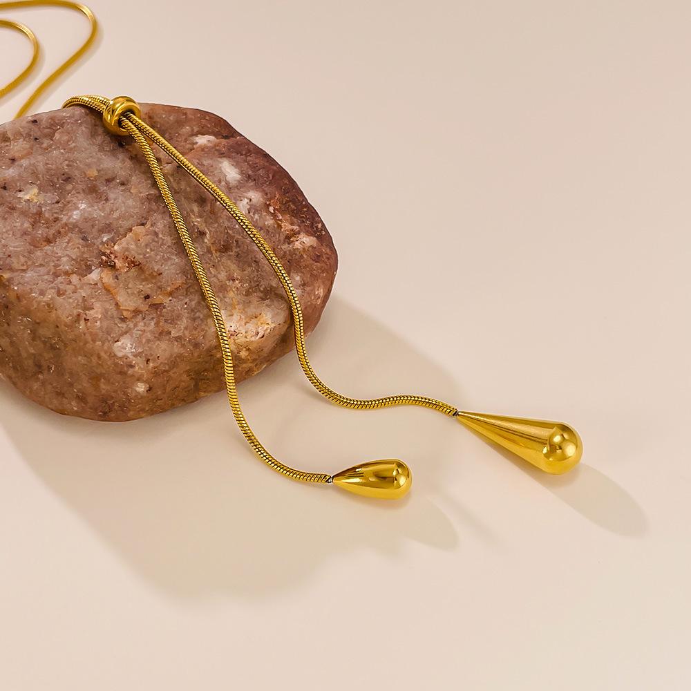 Moda Europa e América Cor Dourada Aço Inoxidável Pingente de Colar com Franja Gota d'Água para Mulheres Corrente Clavicular Joias de Festa