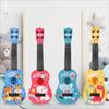 Spielbare Kinder-Ukulele Spielzeug Montessori Mini-Gitarrenspielzeug Cartoon Musikspielzeug Kinder