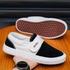 Fashion breathable versatile black and white color matching one-pedal Velcro low-top men's shoes student canvas board shoes