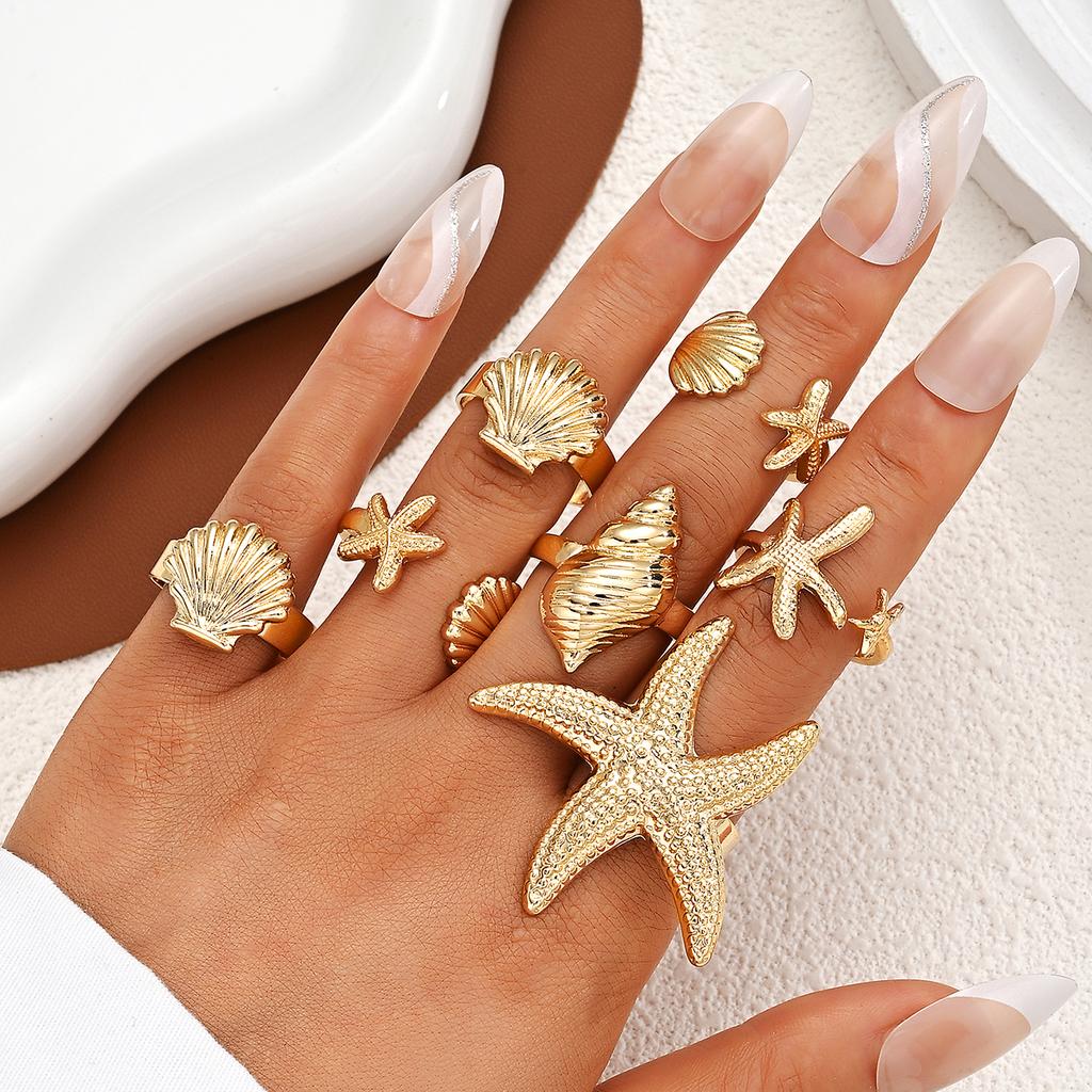 7 Pcs Gold Metal Ring Set for Women Starfish Shell Geometric Flower Knuckle Rings Vintage Daily Stackable Fashion Jewelry Gifts