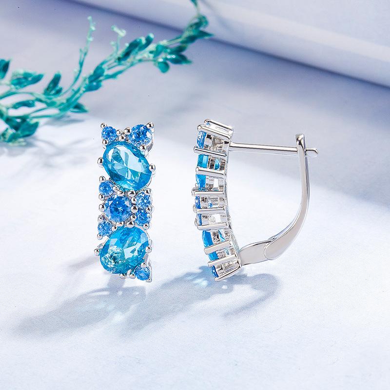 2026 Diamond-encrusted Sea Blue Zircon Earrings Women's European and American Temperament Light Luxury Sea Blue Zircon Earrings Ear Buckle Jewelry