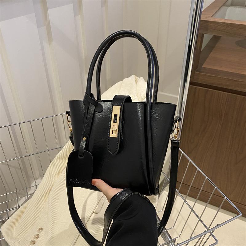 Fashionable Hand-held Bucket Bag for Women's Spring New Niche Design and Fashion Trendy Crossbody Bag